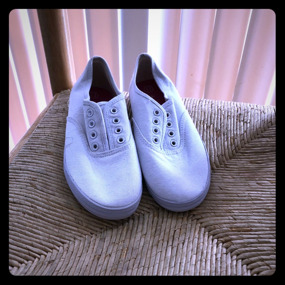 A&E white tennis shoes.